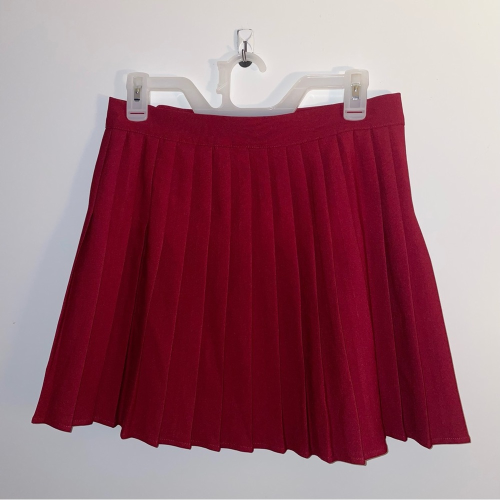 Red pleaded skirt